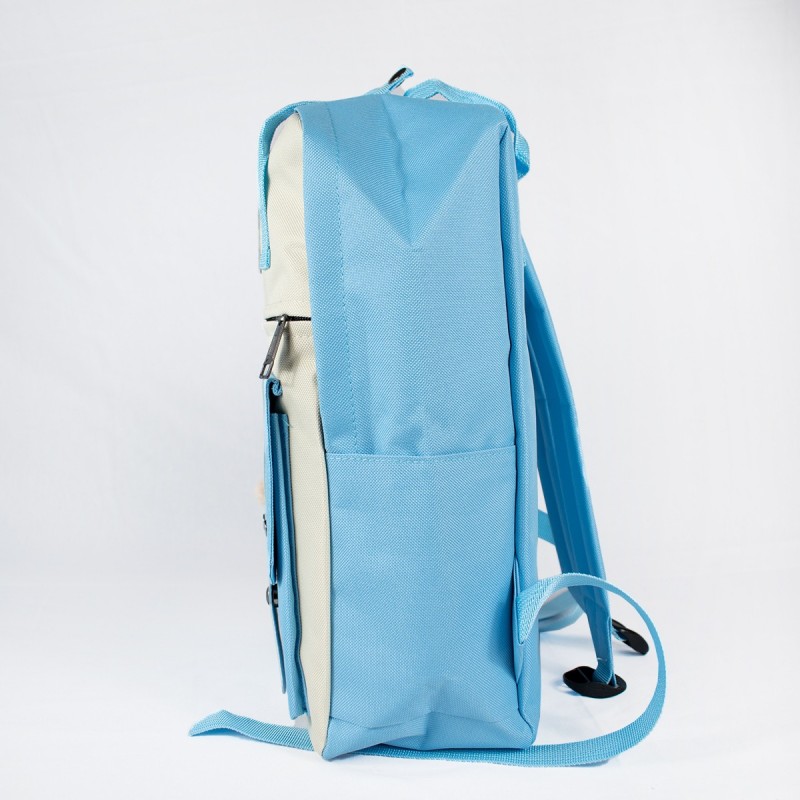 Mochila celeste niño con peluche tierno. Ideal para jardín infantil y colegio. Cómoda y práctica.